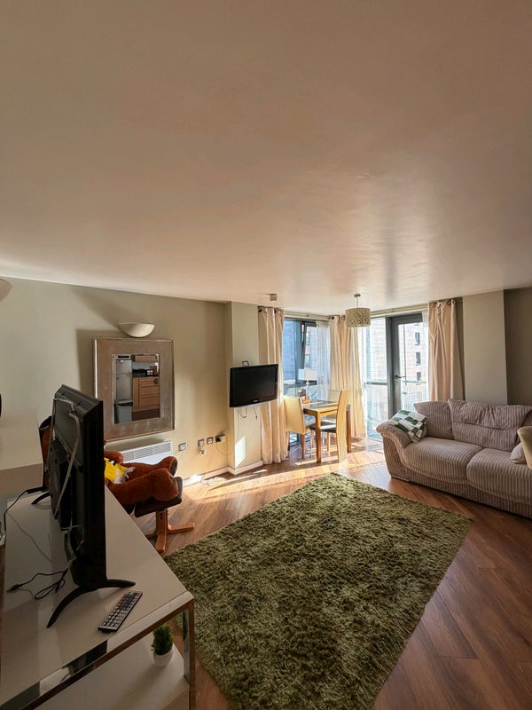 Photo 1: Open plan living area
