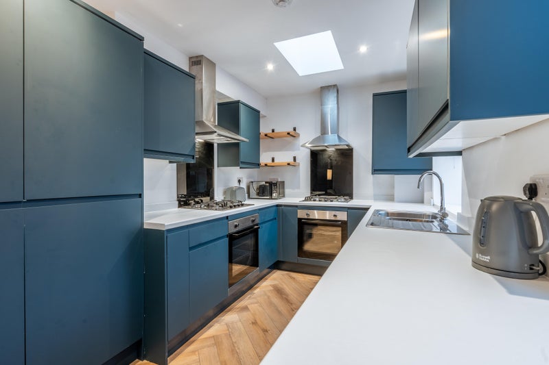 Photo 1: Kitchen