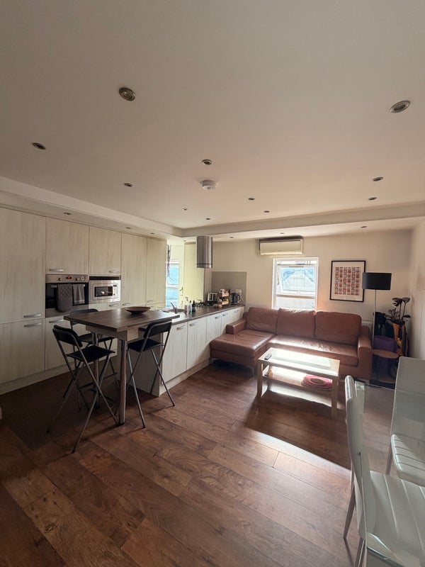 Photo 1: Living room and kitchen