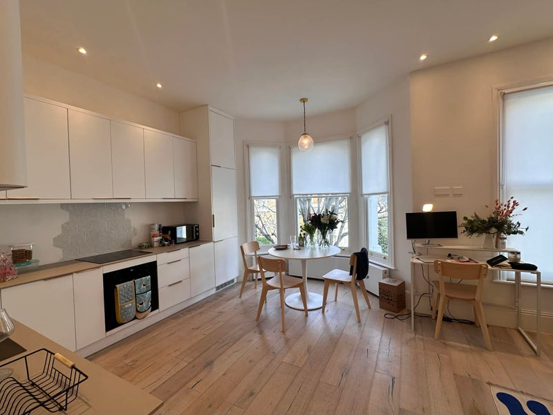 Photo 1: Living area/ kitchen