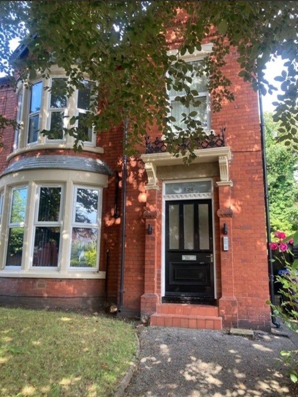 Photo 1: Main entrance