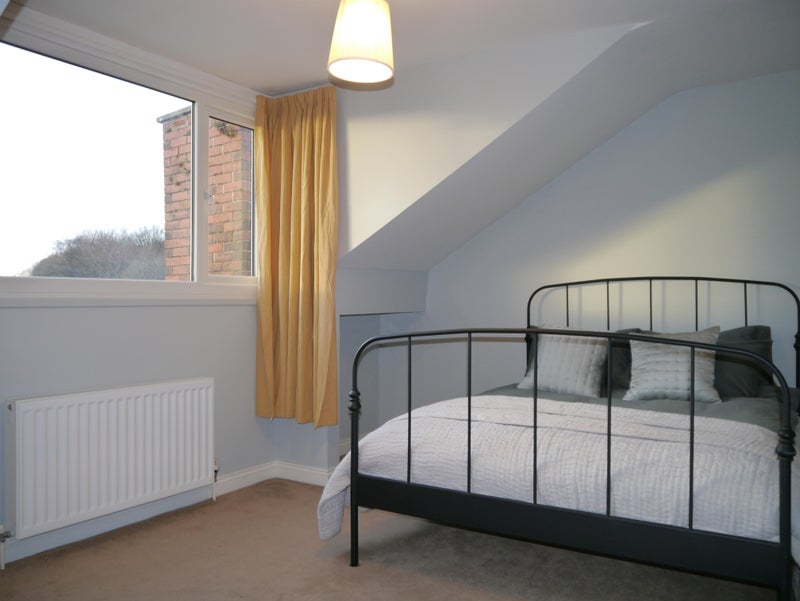 Photo 1: Large West facing window, comfortable bed and mattress