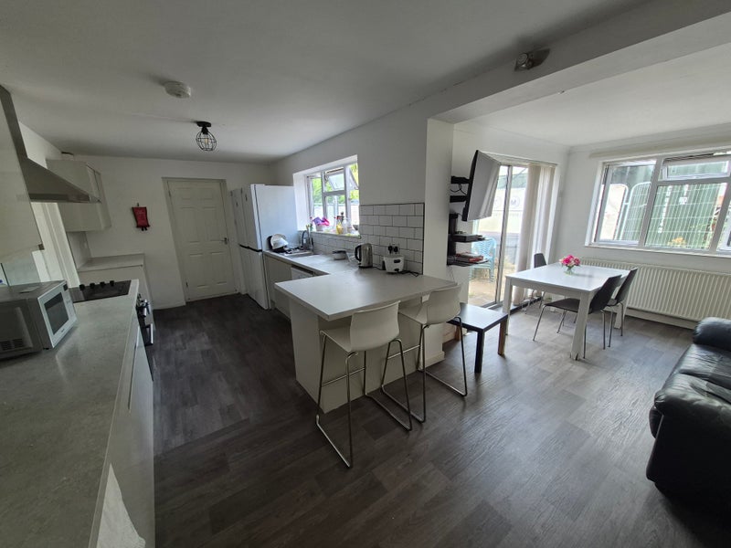 Photo 1: KITCHEN/LIVING