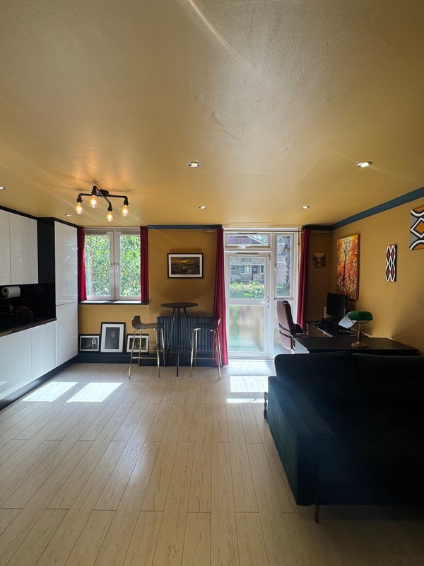 Photo 1: Open plan living area