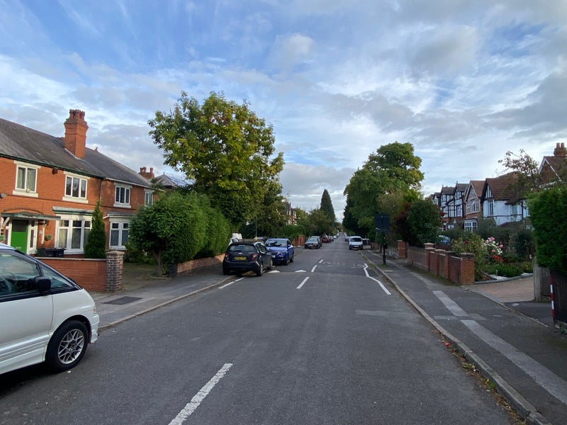 Photo 1: House on left, it’s a pleasant road