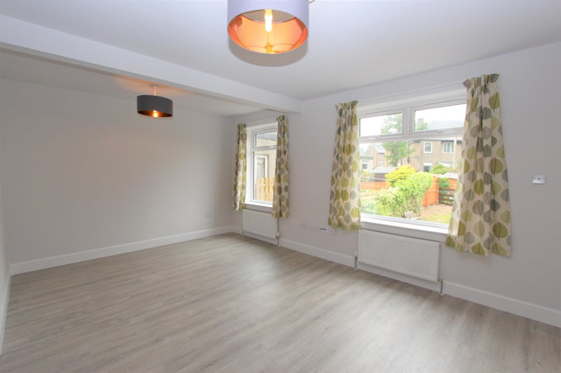 Photo 1: Living room, now fully furnished