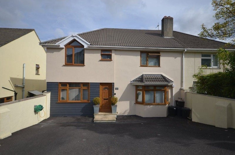 Photo 1: Front of property