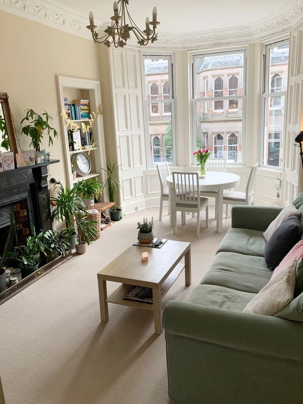 Photo 1: Shared living room space