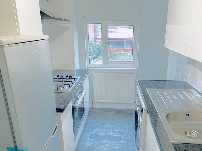 Photo 1: Kitchen