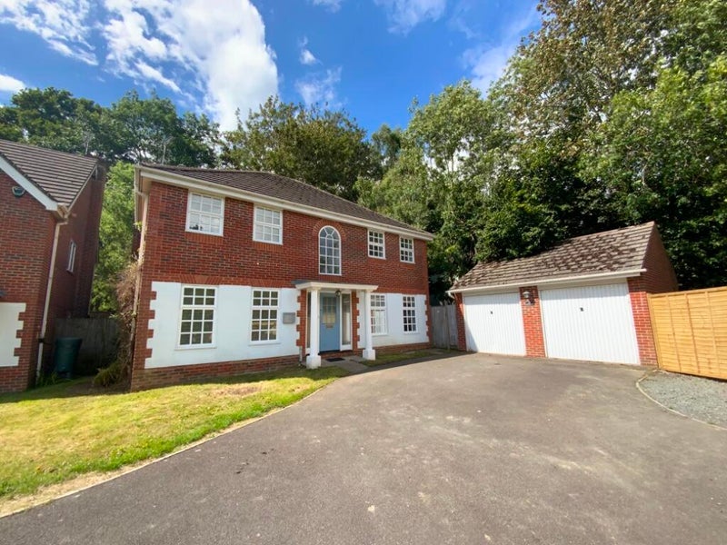 Photo 1: Front of Property with parking