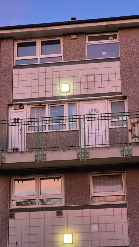 Photo 1: Front View Of Property 