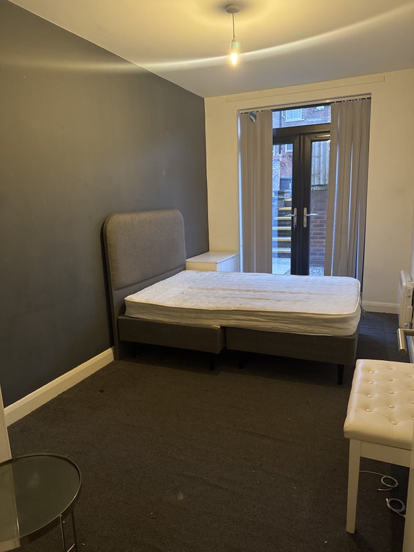 Photo 1: Double Bedroom with nightstand drawer