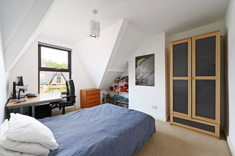 Photo 1: Attic bedroom