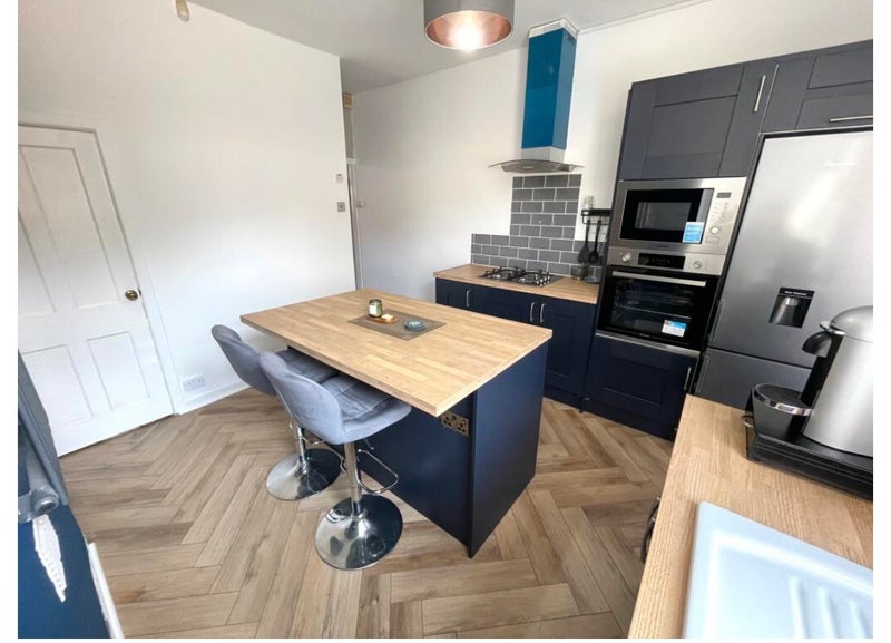 Photo 1: Shared kitchen