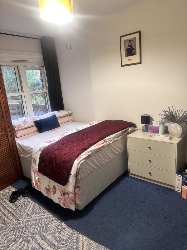 Photo 1: Large bright Bedroom with sink 