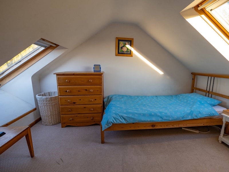 Photo 1: Attic bedsit room. 