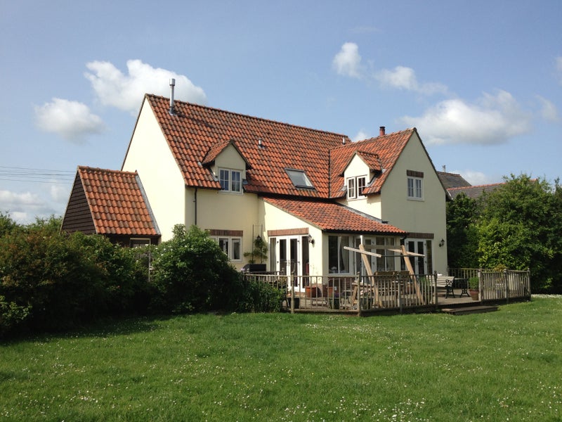 Photo 1: Our village home