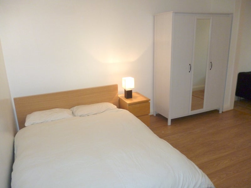 Photo 1: Bed and Wardrobe