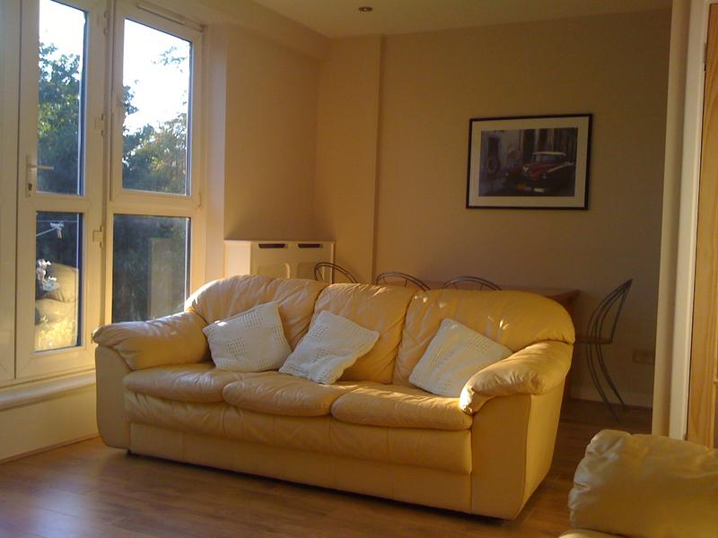 Photo 1: Living/Dining Room