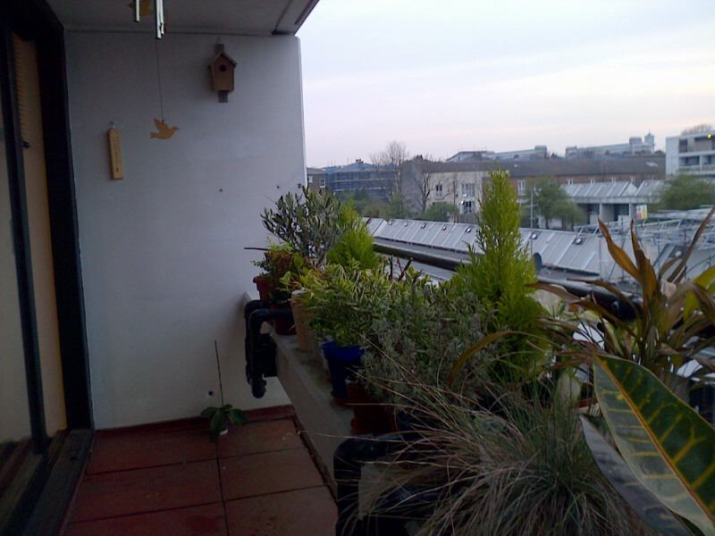 Photo 1: living room balcony