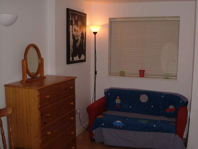 Photo 1: View to drawers and sofa