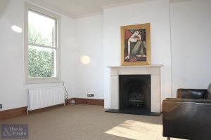 Photo 1: seperate living room