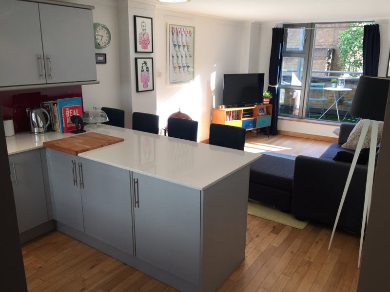Photo 1: Living area / kitchen
