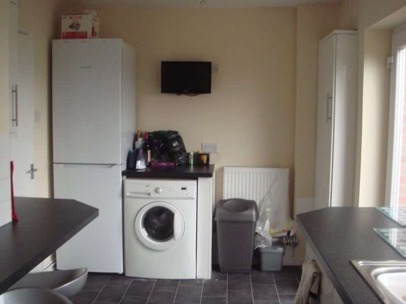Photo 1: large fridge freezer and washing machine
