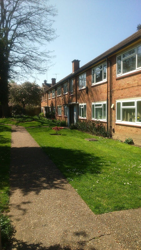 Photo 1: Front of building