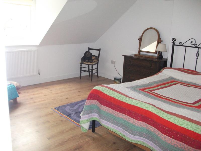 Photo 1: The Attic Room