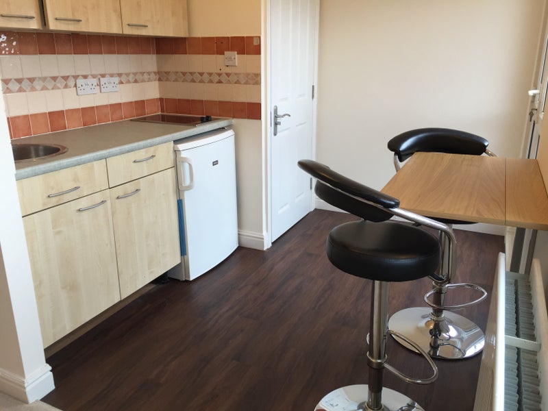 Photo 1: Your kitchen comes with oven, microwave, hob, fridge/freezer, sink - everything you need for cooking