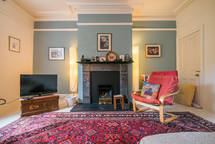 Photo 1: Shared living room