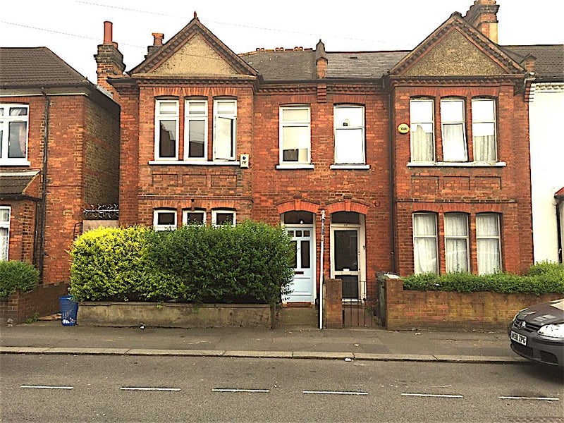 Photo 1: Front of house