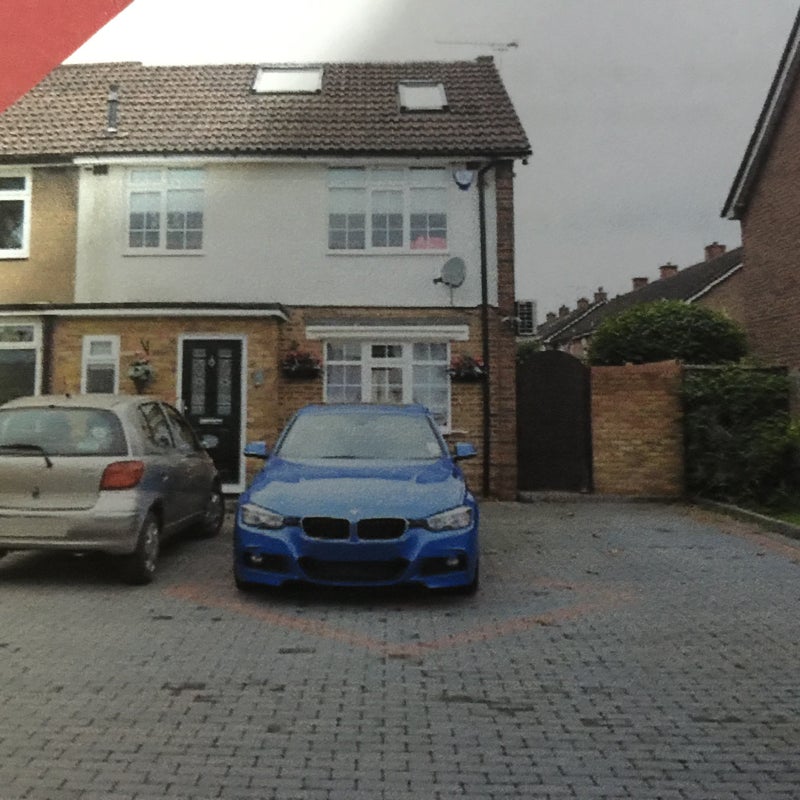 Photo 1: Four/Five space off street parking