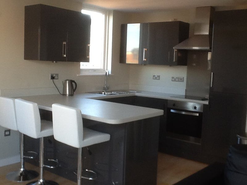 Photo 1: Newly fitted kitchen with breakfast bar
