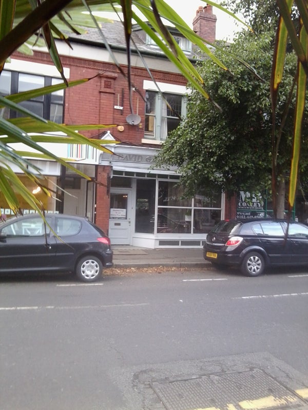 Photo 1: view from street showing front entrance