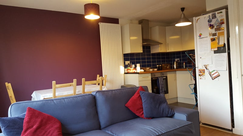 Photo 1: Kitchen and dining area