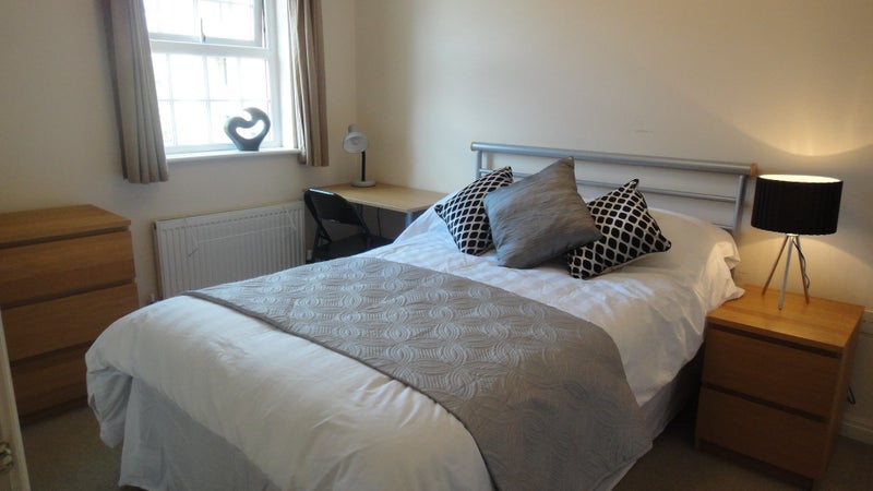 Photo 1: En-suite room with Double Bed and wall of built in wardrobes