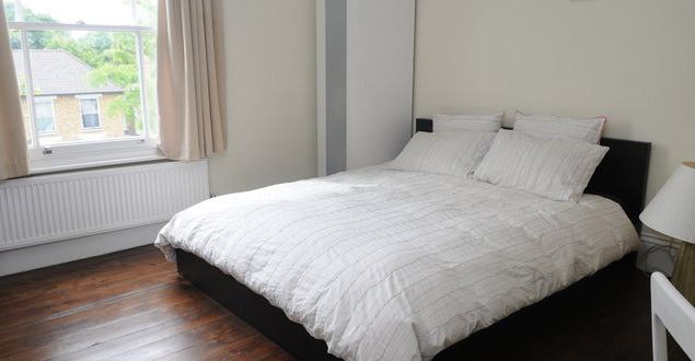 Photo 1: Large front room