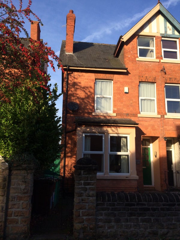 Photo 1: Front of house