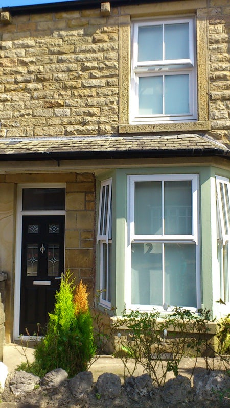 Photo 1: Front of house