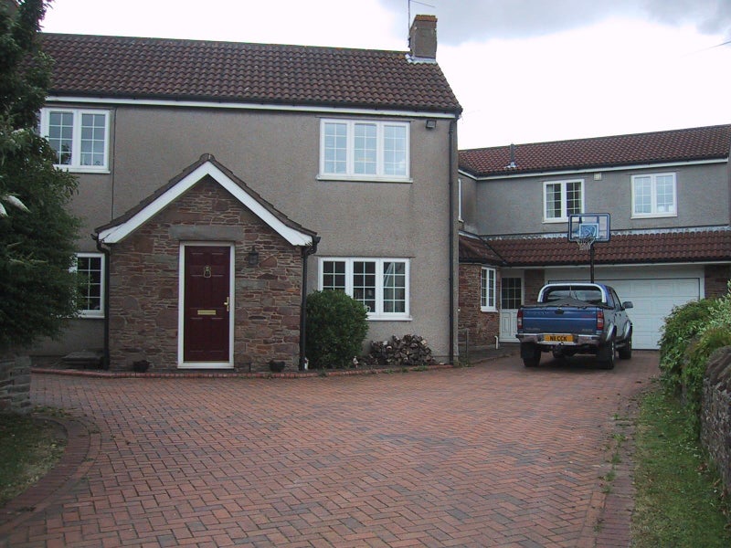 Photo 1: House and front drive