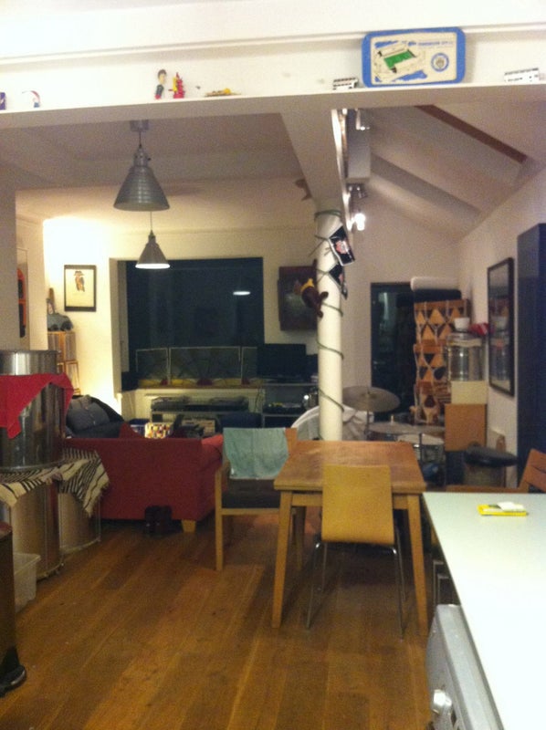 Photo 1: View from kitchen across 'The West Wing'.