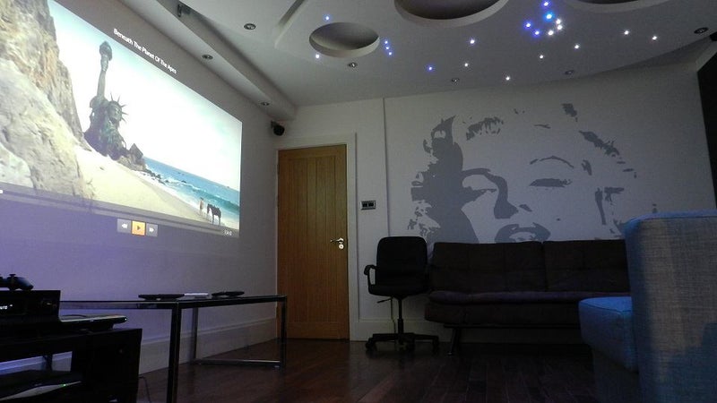 Photo 1: Lounge with Home Cinema and innovative lighting