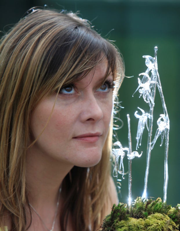 Photo 1: me with one of my ghost orchid sculptures