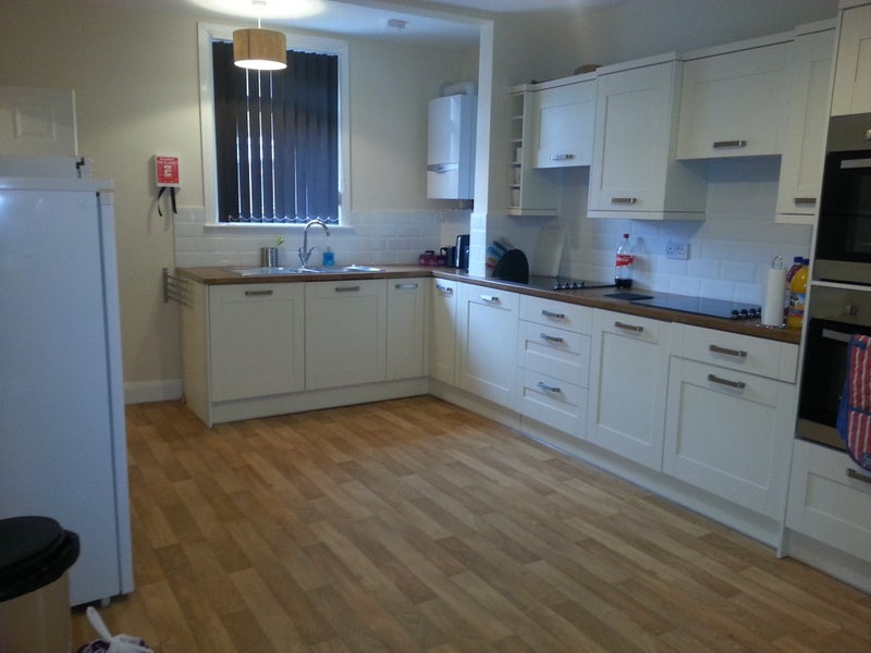 Photo 1: Kitchen