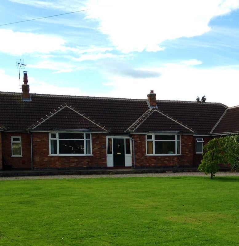 Photo 1: Front of bungalow