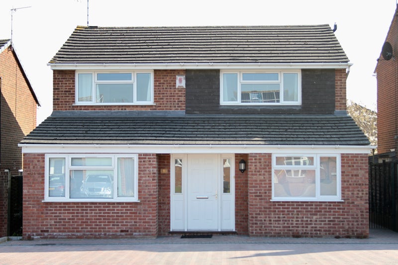 Photo 1: Detached House