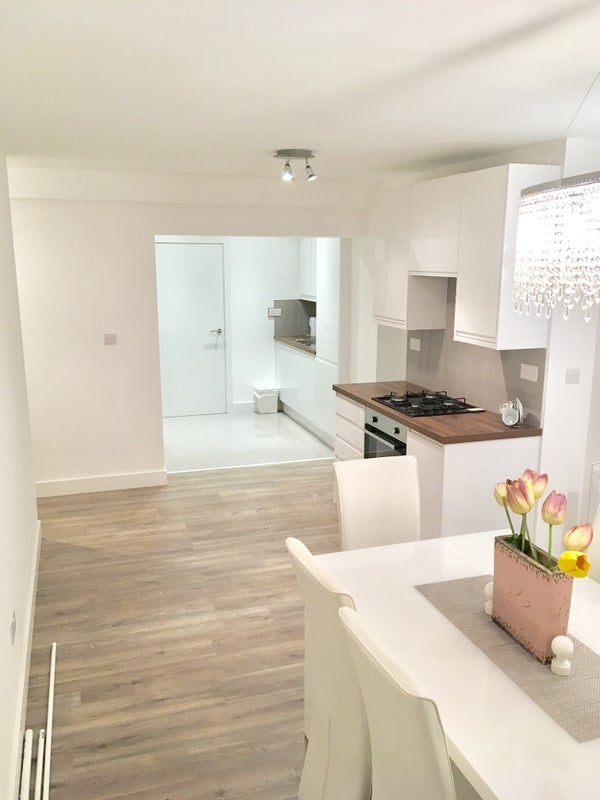 Photo 1: Shared kitchen and dining area