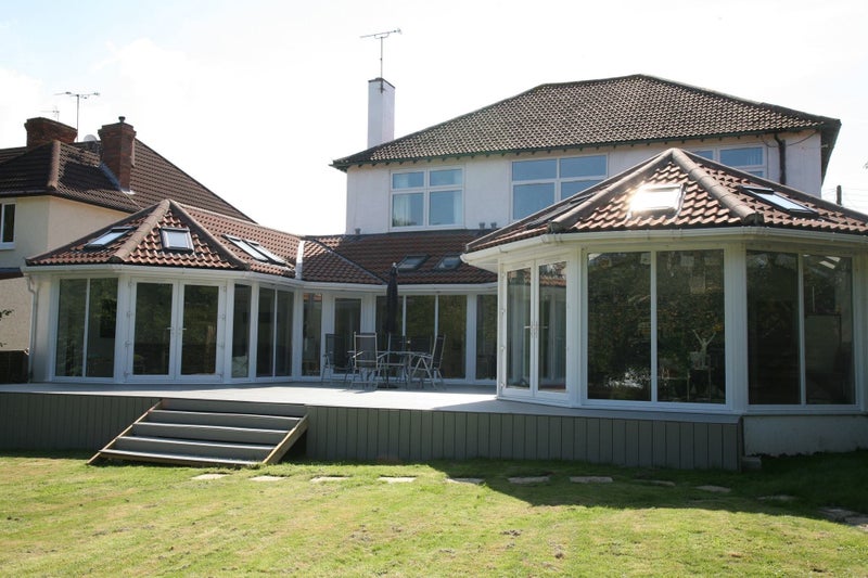 Photo 1: Back of house from garden